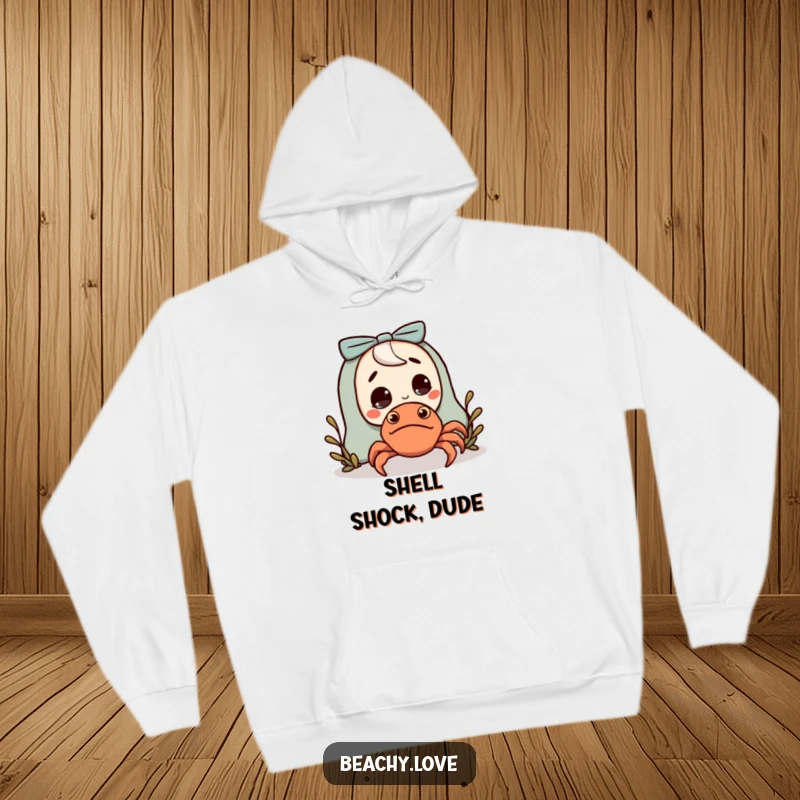 Funny hoodie illustrating a character startled by a tiny, adorable hermit crab, perfect for cozy, humorous wear.