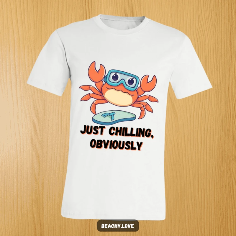 Funny t-shirt featuring a crab wearing a tiny snorkel, sunbathing on a flip-flop. Humorous beach and ocean design for relaxation lovers. Hilarious graphic.