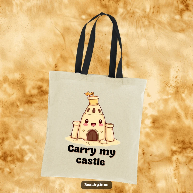 Funny tote bag featuring a happy sandcastle proudly wearing a tiny bucket and spade on its head, perfect for beach trips.